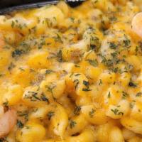 Seafood Mac · Cheddar cheese, elbow pasta with shrimp and scallops.