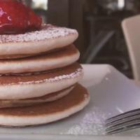 Mixed Berries Crepes · Freshly made crepes stuffed with tangy triple-berry topped with fresh Chantilly cream.