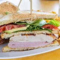 Ultimate Club · White bread, mayo, lettuce, tomato, crispy bacon, avocado, sliced turkey, arugula.