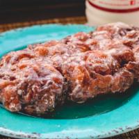Apple Fritter · A large pastry blended with cinnamon and apple bits.  A classic! Each piece 360 total calori...