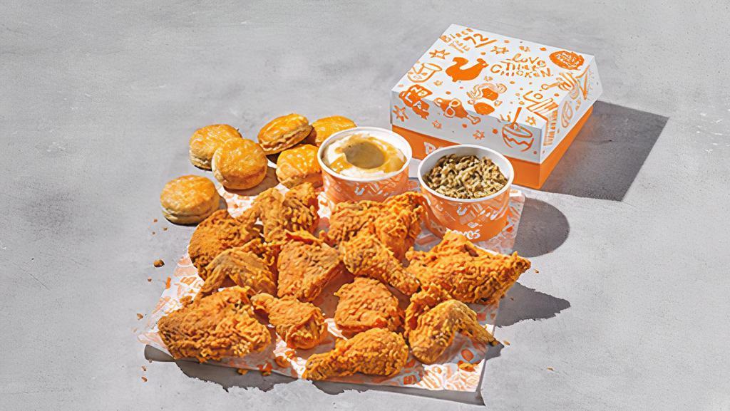 12Pcs Signature Chicken Family Meal · Twelve pieces of our signature chicken. Served with 2 large sides & 6 biscuits.
