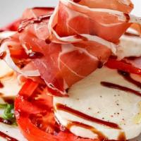 Caprese · Fresh mozzarella, prosciutto, balsamic vinegar and olive oil.