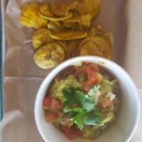 Guacamole · Avocado, Lime, Tomato, Red Onion, Cilantro. Served with Plantain Chips.. Gluten Free