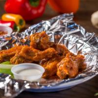 6 Jumbo Wings · Tossed in your favorite wing sauce. Served with blue cheese or ranch.