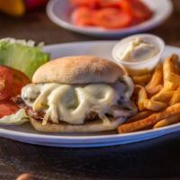 Grilled Chicken Sandwich · Seasoned grilled chicken breast, caramelized onions, sautéed mushrooms, and provolone served...