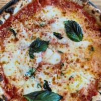 The New Yorker · tomato, shredded mozzarella and  oregano