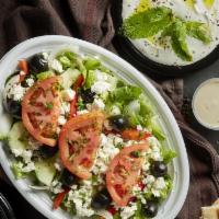 Greek Salad · Lettuce, tomatoes, cucumber, green onions, green pepper, feta cheese, and calamata olives, t...