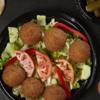 Falafel Platter · Six pieces. Lettuce, tomatoes, reddish, and falafel. Served with your choice of two sides an...