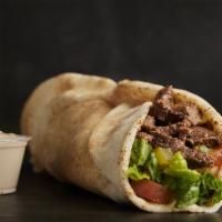 Shawarma Mix Meat Chicken Wrap · Skinless, boneless chicken breast, selected layers of beef, marinated with herbs and spices....