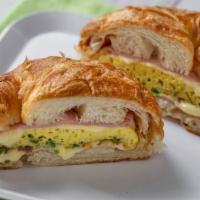 Croissant With Ham · with Fresh Eggs & Cheese.