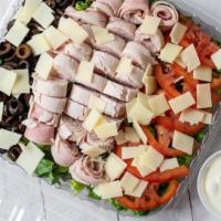 Chef Salad · Ham, turkey breast, swiss cheese tomatoes, black olives & romaine lettuce.