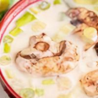 Thai Coconut Soup · Made fresh daily with scallions and mushroom