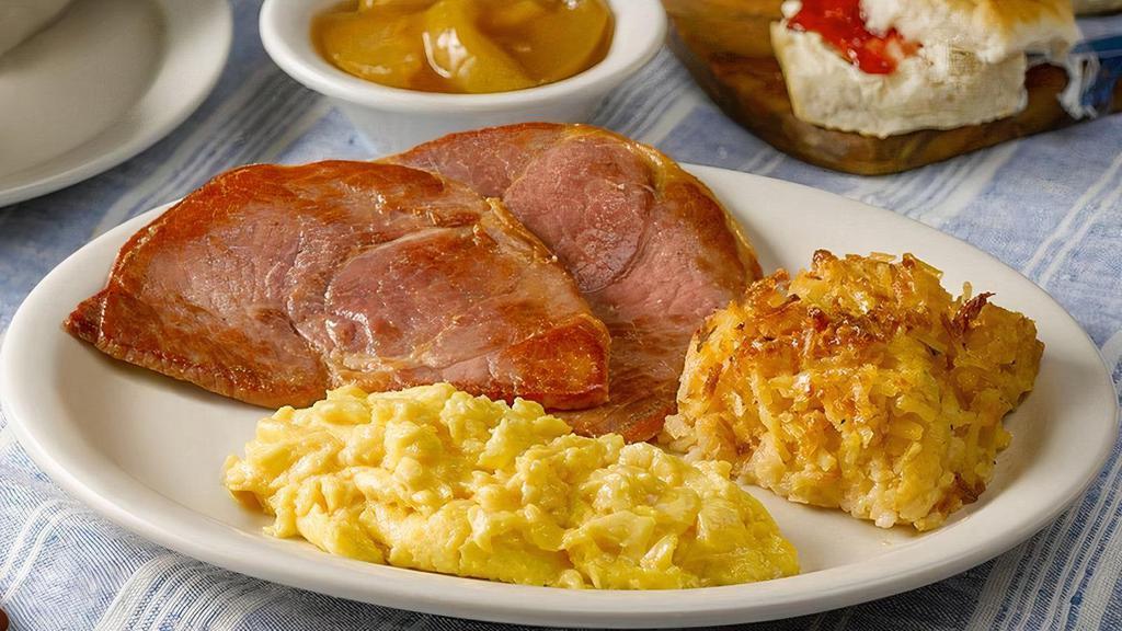 The Cracker Barrel'S Country Boy Breakfast · Enjoy three eggs* with your choice of two Breakfast Sides plus Sirloin Steak Tips, Sugar Cured or Country Ham. Served with Biscuits n' Gravy. .