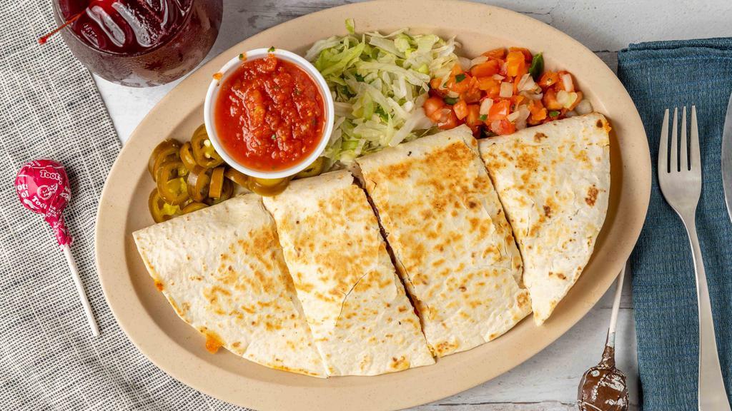Quesadilla · Vegetarian, vegan.  House shredded aged cheddar cheese melted on a flour tortilla,  served with shredduce, jalapeños and  pico.