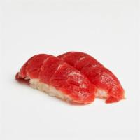 Tuna Nigiri · Two pieces of tuna over pressed sushi rice.
