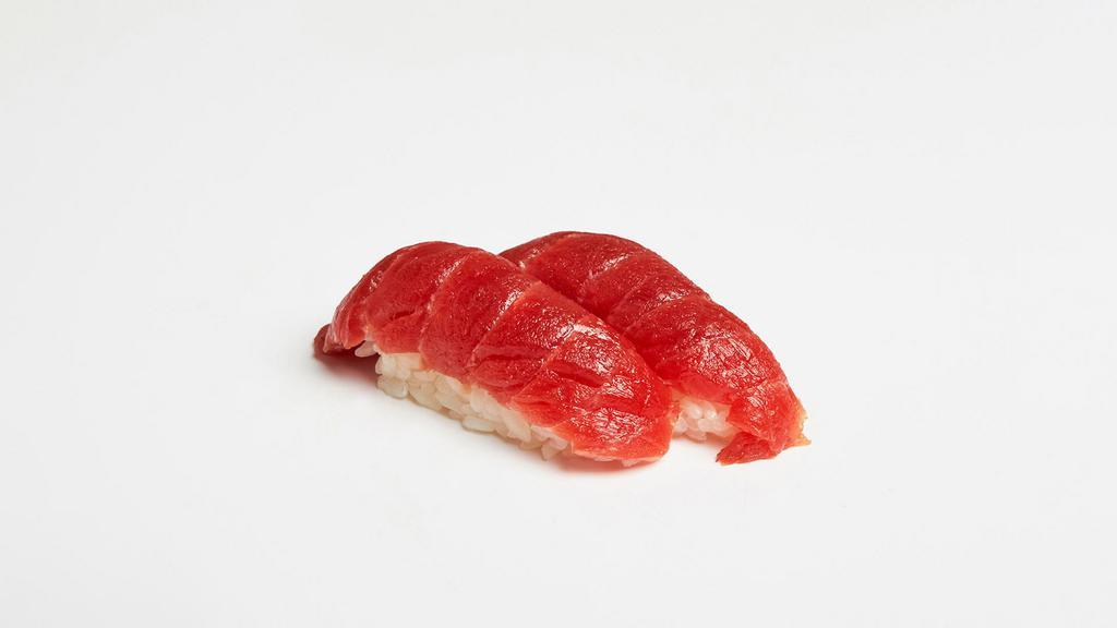 Tuna Nigiri · Two pieces of tuna over pressed sushi rice.