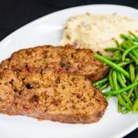 Chicken Fried Chicken · Southern fried boneless chicken breast. Served with green beans and mashed potatoes topped w...