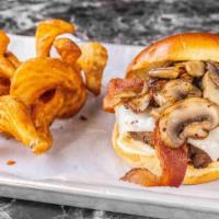 Mushroom Bacon And Swiss Burger · Mushrooms, bacon, Swiss cheese, and mayonnaise. Served on brioche bun with sidewinder fries.
