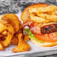 Texas Tavern Burger · BBQ sauce, crispy applewood bacon, pepper Jack cheese, lettuce, and tomato with crispy onion...