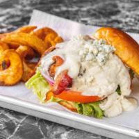 Black And Blue Burger · Blackened burger, blue cheese sauce, bacon, lettuce, tomato, red onion, and blue cheese crum...
