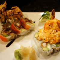 Spider Roll · Soft shell crab tempura, avocado, cucumber, spicy mayo, topped with masago and eel sauce.