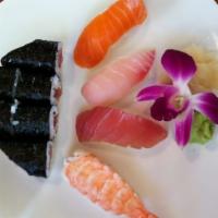 Nigiri Sushi Plate · Chef's choice of ten pieces nigiri and one dragon roll. Served with soup