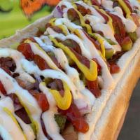 Monster Dog · 1/4 pound Beef hot dog, crispy bacon, onions, mozzarella cheese, crushed potato chips, and m...