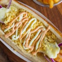 Regular Dog · 1/4 pound Beef hot dog, mozzarella cheese, crushed potato chips, and monster sauces.