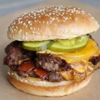 6 - Double Bacon Cheeseburger · Two 50% beef/50% bacon patties, Tillamook yellow cheddar, pasture-raised bacon, grilled onio...