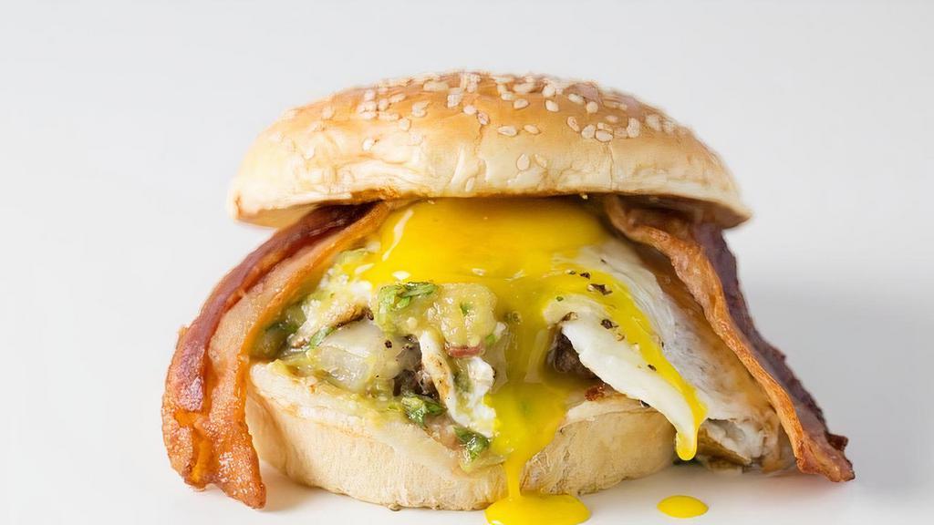 5 - Sunny-Side Burger · 100% Grassfed Beef, pasture-raised bacon, pepperjack cheese, sunny-side up egg, salsa verde.