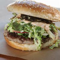3 - Pastured Pig Burger · Pasture-raised Pork, Candied Jalapeños, Lemongrass-Brussels Sprouts-Apple Slaw, Chili Mayo