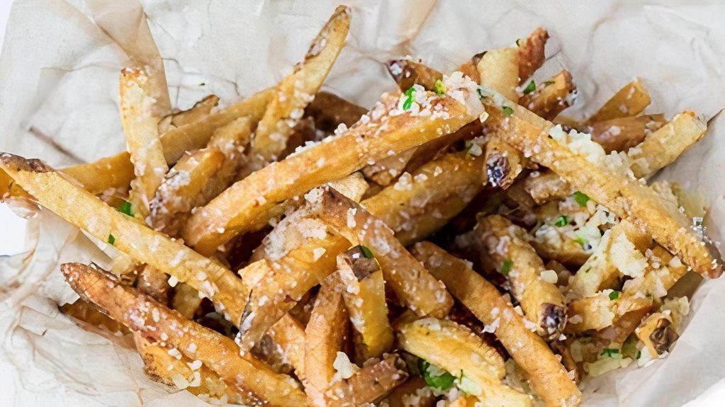 Basket Of Fb Fries · Signature hand-cut fries topped with parmesan, garlic and herbs.