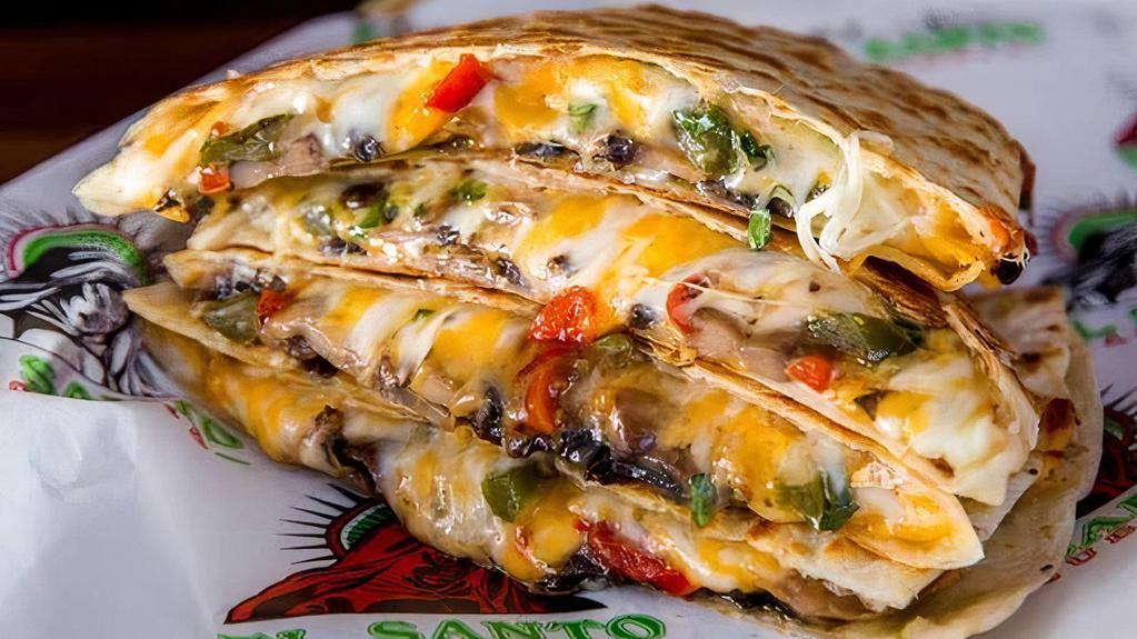 Sexy Shrooms Quesadilla · Mushrooms. Peppers, Queso blend