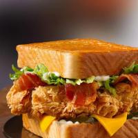 Chicken Club Sandwich · Crispy chicken, bacon, cheddar cheese, lettuce, tomatoes, mayo on buttered texas toast