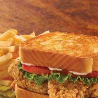 Classic Chicken Sandwich · Crispy chicken, lettuce, tomato, caramelized onions and mayo on buttered texas toast