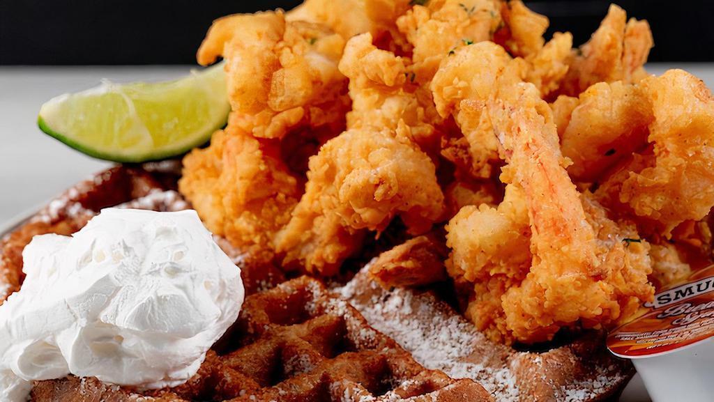Shrimp & Waffles · Try Breakfast the Lovely’s Way! 10 succulent, perfectly fried, jumbo shrimp paired
with one of our signature sweet, vanilla laced Belgium style waffle. We recommend
a drizzle of our dark rum infused maple syrup to complete this delectable dish.
Experience the taste. Feel the love!