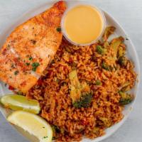 Island Spiced Salmon · Served with pineapple chutney vegetable fried rice.