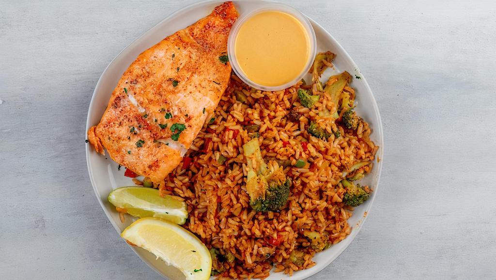 Island Spiced Salmon · Served with pineapple chutney vegetable fried rice.
