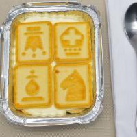 2 Die 4 Banana Pudding · Banana pudding (cold) made in house topped with chessmen butter cookies.