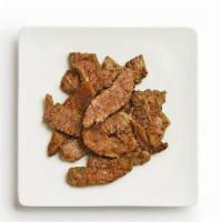 Steak Pita · Our steak is marinated in Middle Eastern seasonings and grilled to perfection.