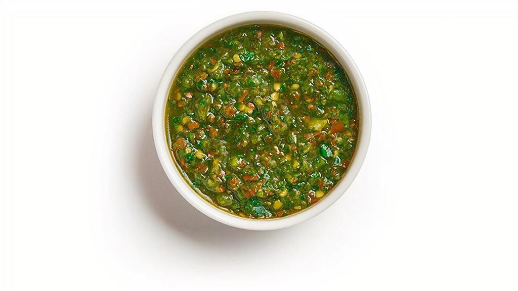 S'Khug · Spicy green sauce made with jalapeños & seasonings.