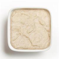 Large Hummus · A smooth spread made from chickpeas, tahini, garlic, and lemon. Comes with fresh baked pita.