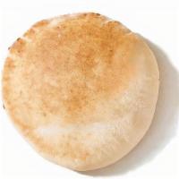 Pita · Delightfully warm and fluffy. Baked fresh everyday. Limit of 6.