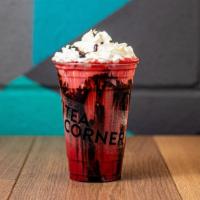 Red Velvet Latte · Red velvet cake in a cup. Topped off with whipped cream and chocolate drizzle.