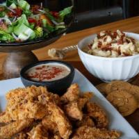 Harlem Tender Box · Feeds 4. Sixteen Harlem Chicken Tenders served with Comeback Sauce, three sides of mac n che...
