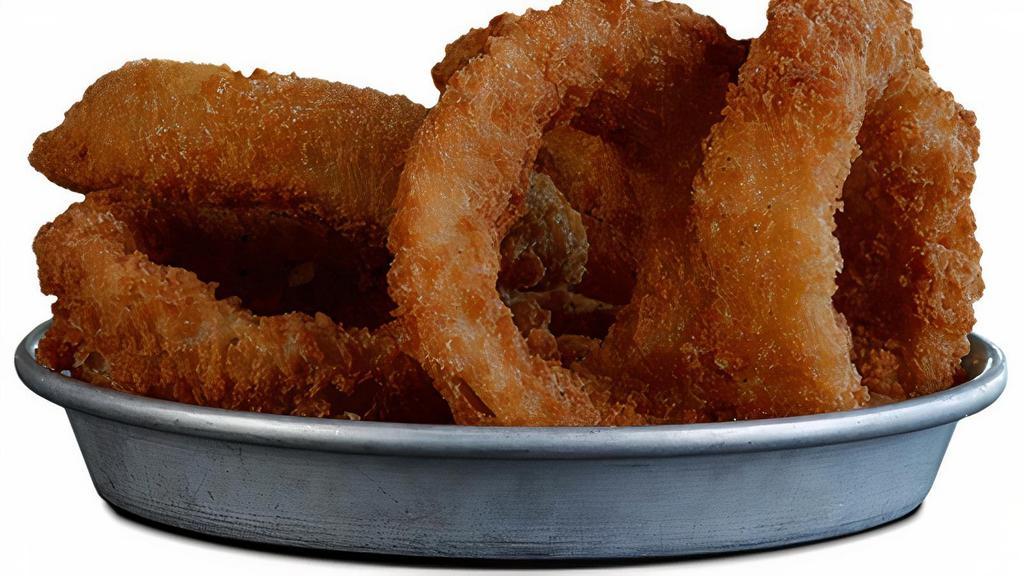 Onion Rings · Hand battered in Shiner Bock beer batter, deep fried & served with our house made chipotle ketchup.