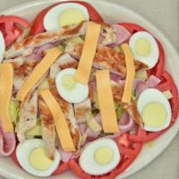 Chef Salad · Turkey, Ham, Lettuce, Tomato, Egg, American Cheese and Swiss Cheese.