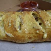 Cheese Calzone · Mozzarella, Parmesan, and ricotta cheeses baked inside of a pizza crust.