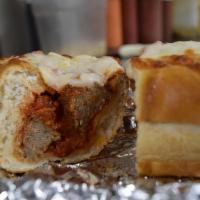Meatball Sub · Hearty meatballs baked with mozzarella and topped with marinara.