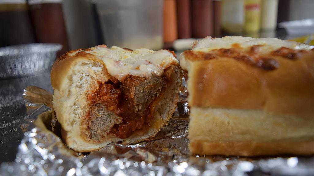Meatball Sub · Hearty meatballs baked with mozzarella and topped with marinara.